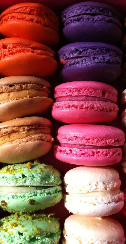 Assorted colourful French macarons — luxury petit fours for VIP inflight catering